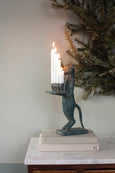 Otto the Candle Holder in dark bronze with four burning candles