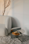 Acron tealight holder from the Straw on metal table