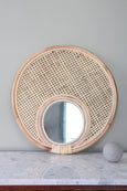 The Straw Round Rattan Mirror from the front