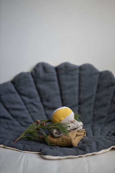 Circus Ball Toy in recycled linen with bell on Shell Mattress