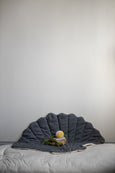 Baby Swaddle blankets on Shell Mattress against wall in organic muslin