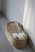 Handmade Baby Basket in Ecru with textiles from above