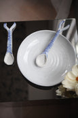 Ceramic Fin Spoon Petit hand-painted on plate with flower