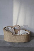 Baby Basket in Ecru with hypoallergenic mattress from the side with Shell Mattress Small