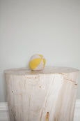 Circus Ball Toy in eco-friendly material with bell  on wooden table