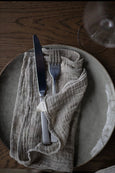 Kitchen Muslin Cloth on plate with fork and knife