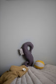 Soft baby toy Sea Horse in recycled linen against wall