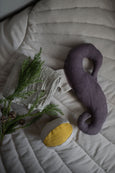 Soft baby toy Sea Horse next to ball and twigs made from recycled linen