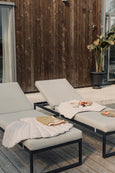 Thin Beach Blanket laying on outdoor furniture