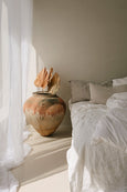 Vintage Pot Drop Shape with Palm Leafs by bed 